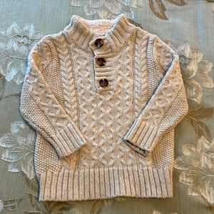 Cable knit sweater with button detail!